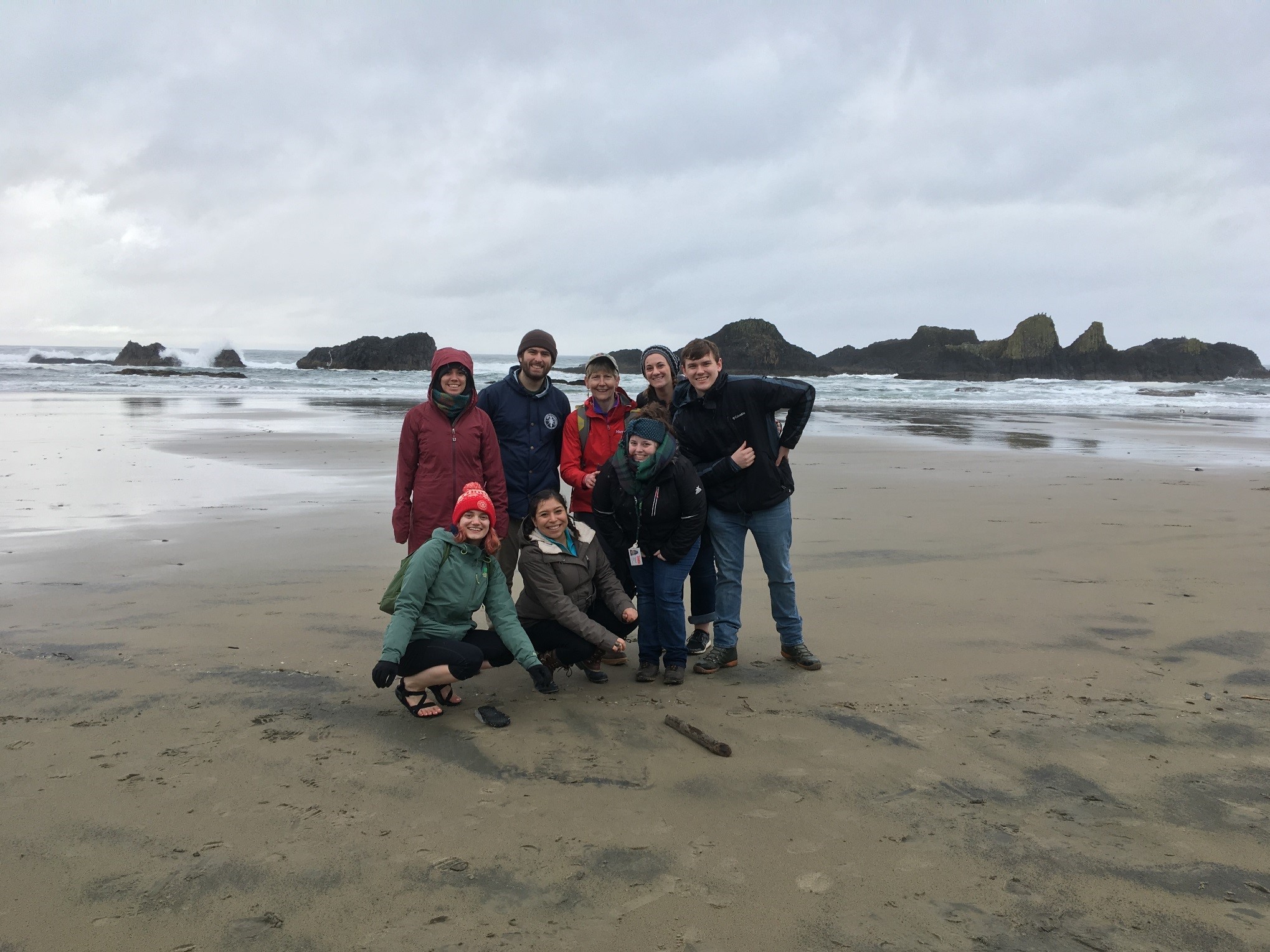 group of people on Oregon coast