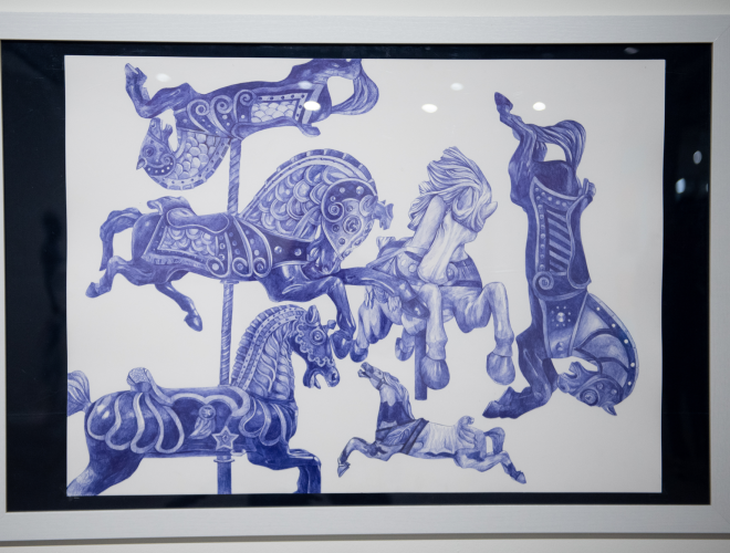 Blue ball point pen drawing of carousel horses.