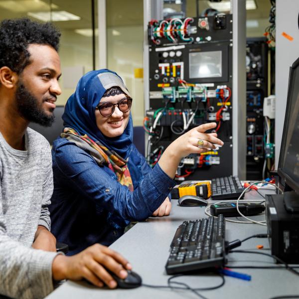 engineering students working on computer