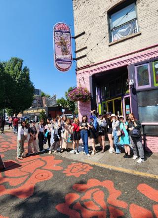 Students outside of Voodoo Donuts
