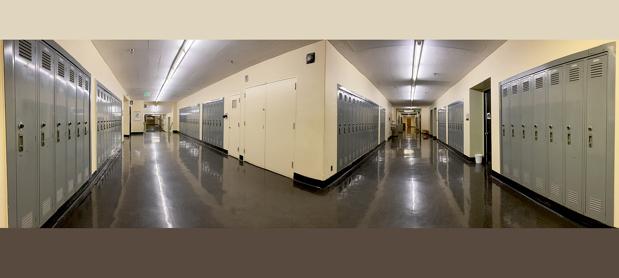 Campus lockers for rent are seen on all sides of a corridor intersection in Cramer Hall.