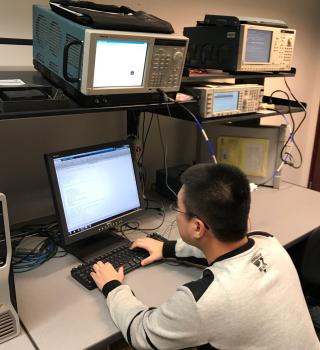 Student in communications lab