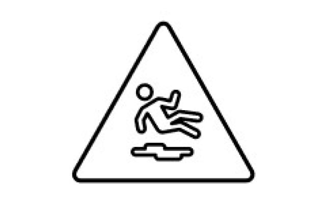 A triangle symbol with a person in the center that has slipped and fallen