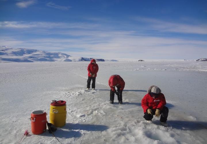 Students conducting ice coring in Antarctica