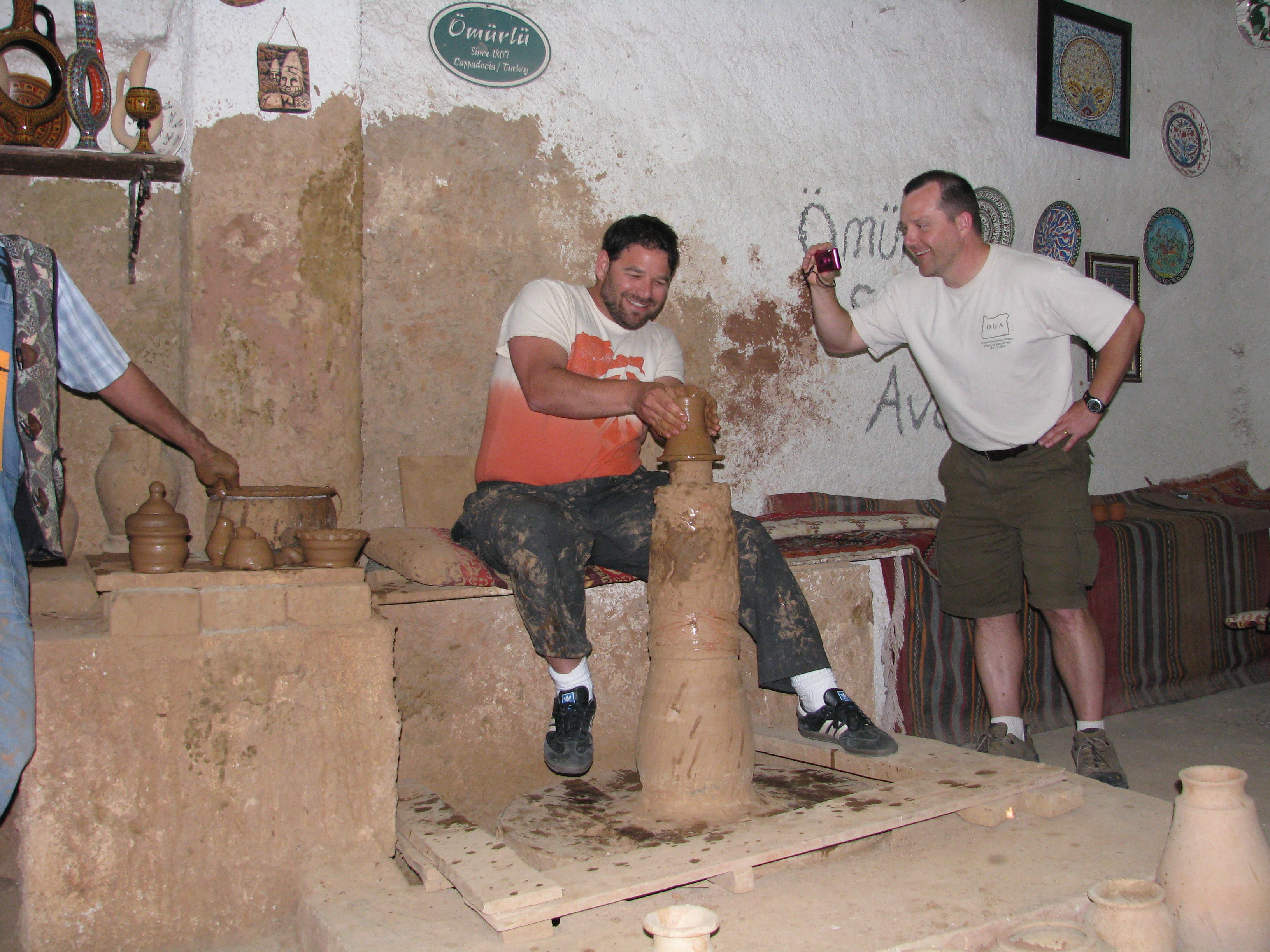 C-GEO TC working on a large piece of pottery during an international institute