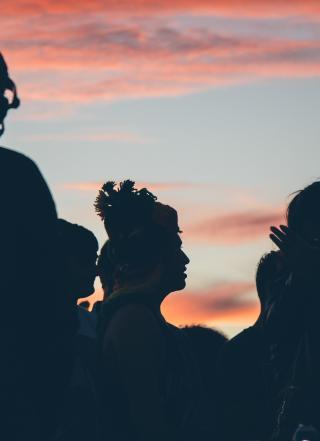 Silhouette of a group of people.