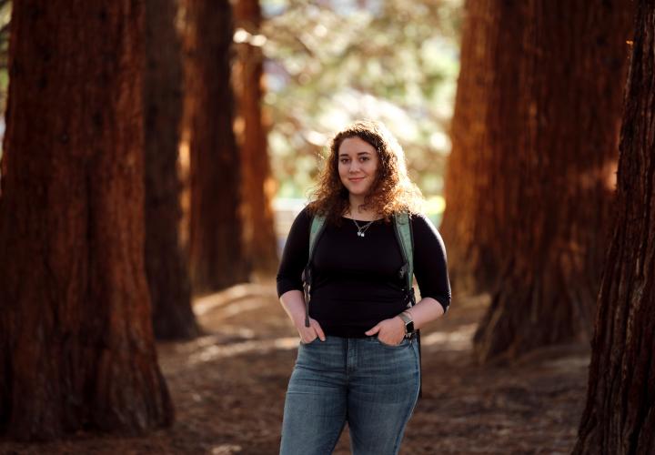 PSU honors student walking in the woods