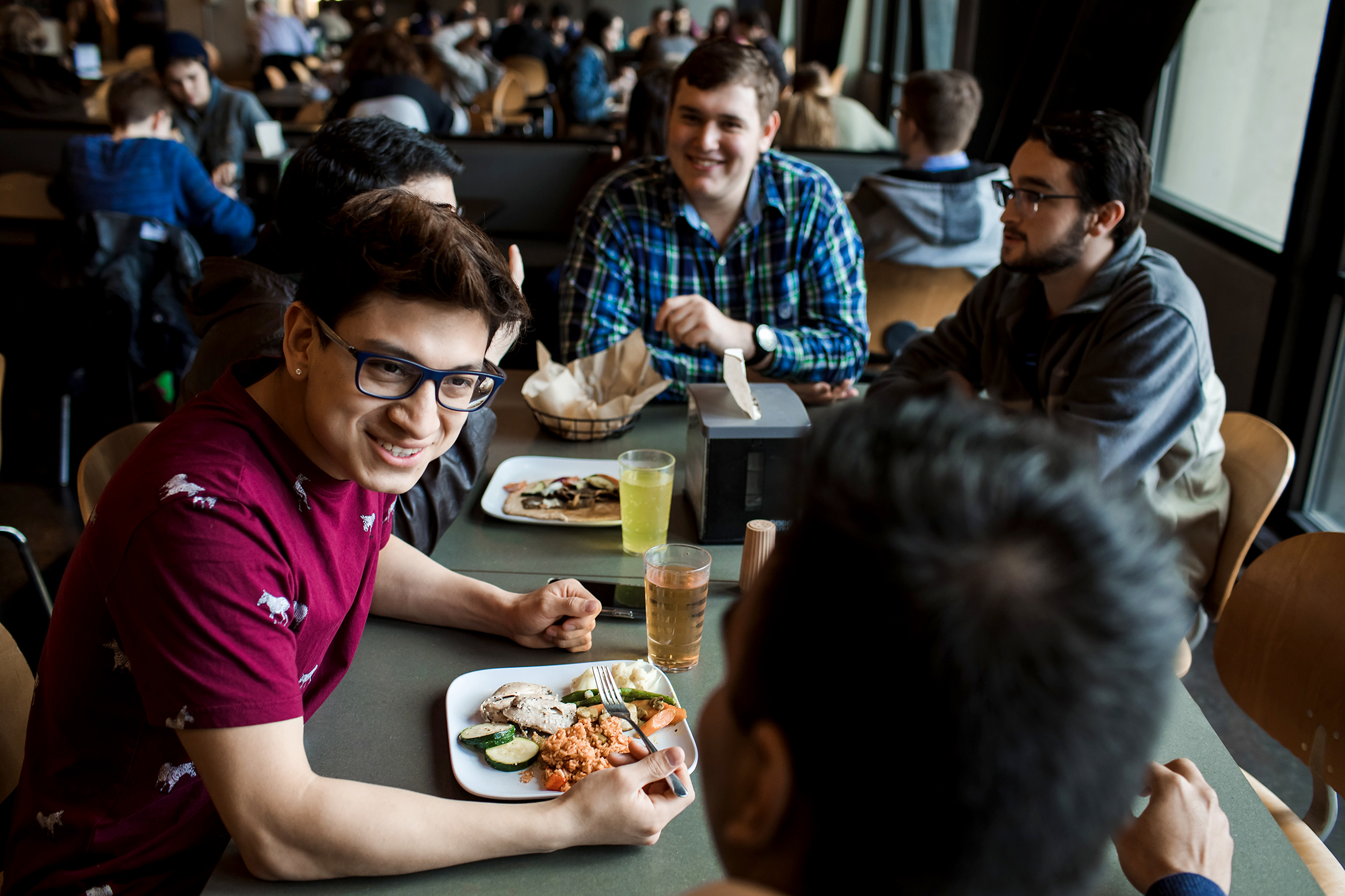 Students sharing a meal in Victor's Dining Hall