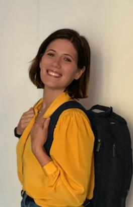 Picture of Dawn, yellow shirt and backpack
