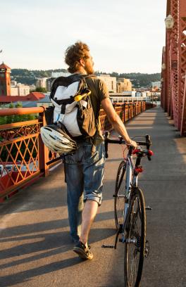 Student with bike on Hawthorne Bridge