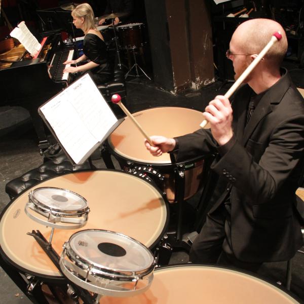 Percussion student performing with the PSU Orchestra