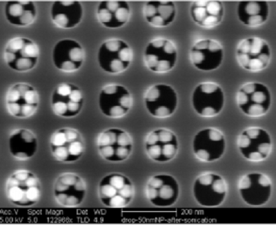 Gold nanoparticles filling holes created in a 185 nanometer (nm) PMMA photoresist