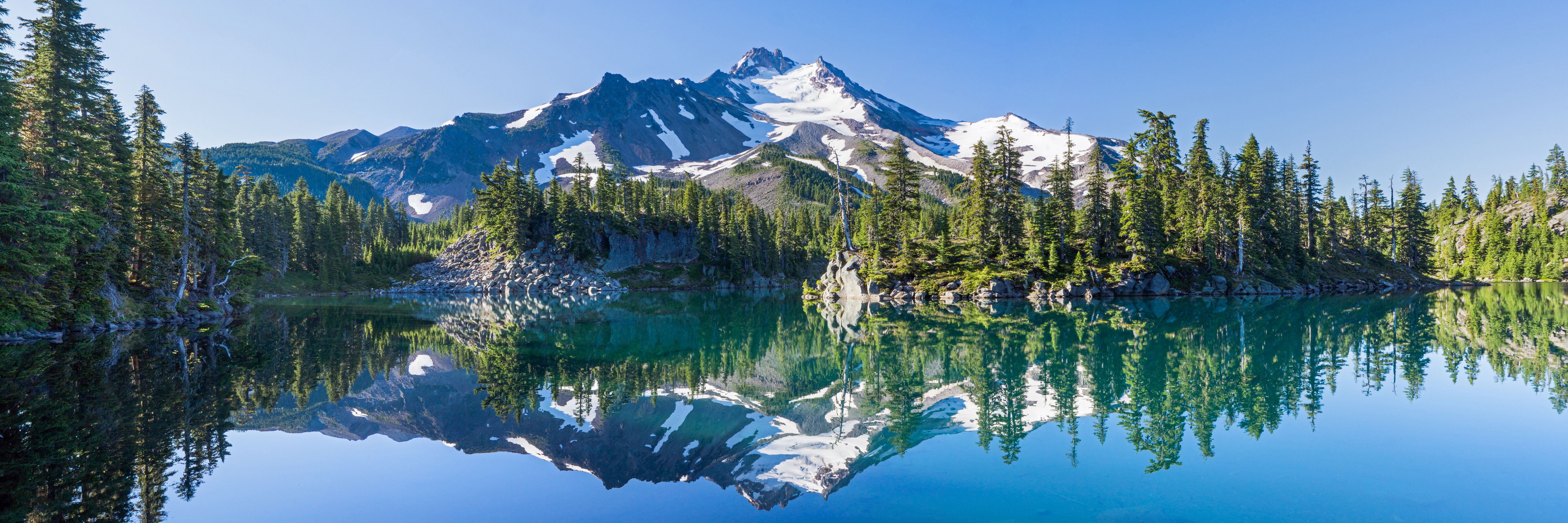 Mount Jefferson reflected in a mountain lake in Oregon