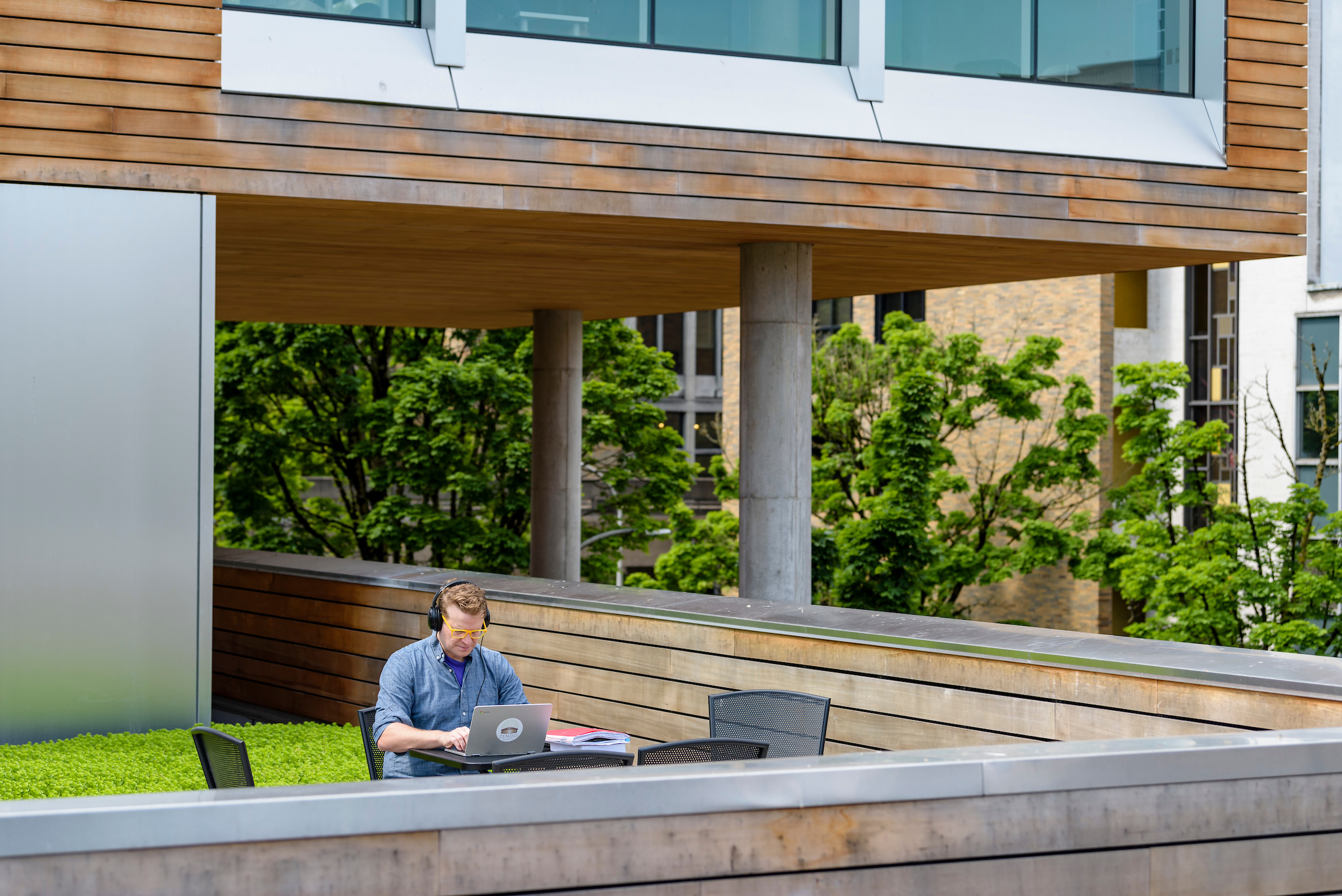 PSU online student studying on rooftop terrace