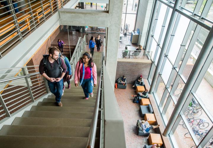 Students walk up the stairs to the second floor of the ASRC 