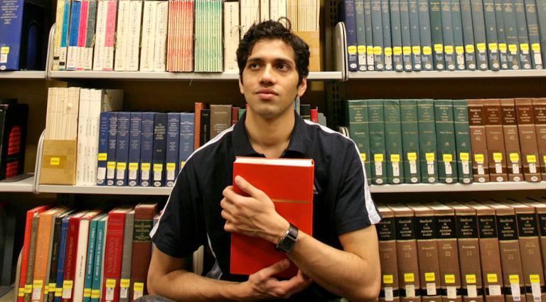 PSU English student in a library
