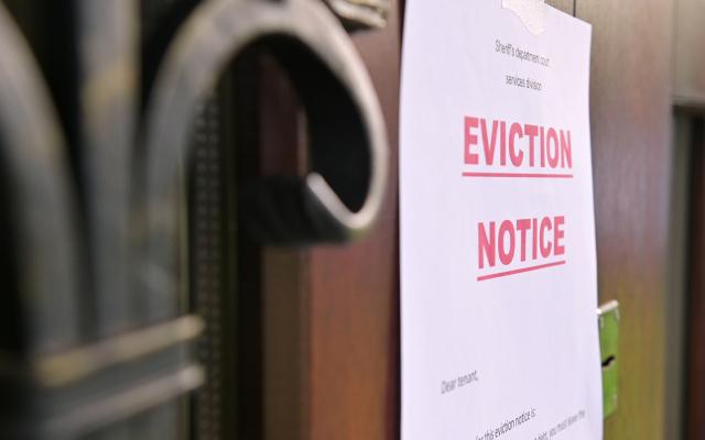 Eviction notice posted on a door