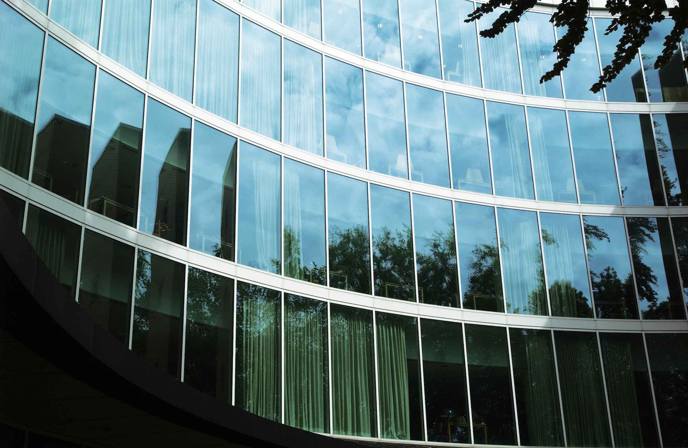 Outside view displaying the windows of multiple stories from the Miller Library at PSU.