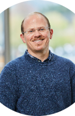 Portrait of Lindsey Wilkinson, smiling at camera
