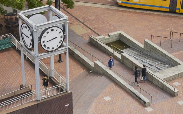 clock tower and street car