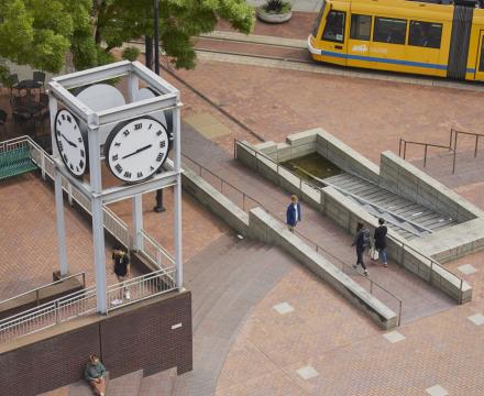 clock tower and street car