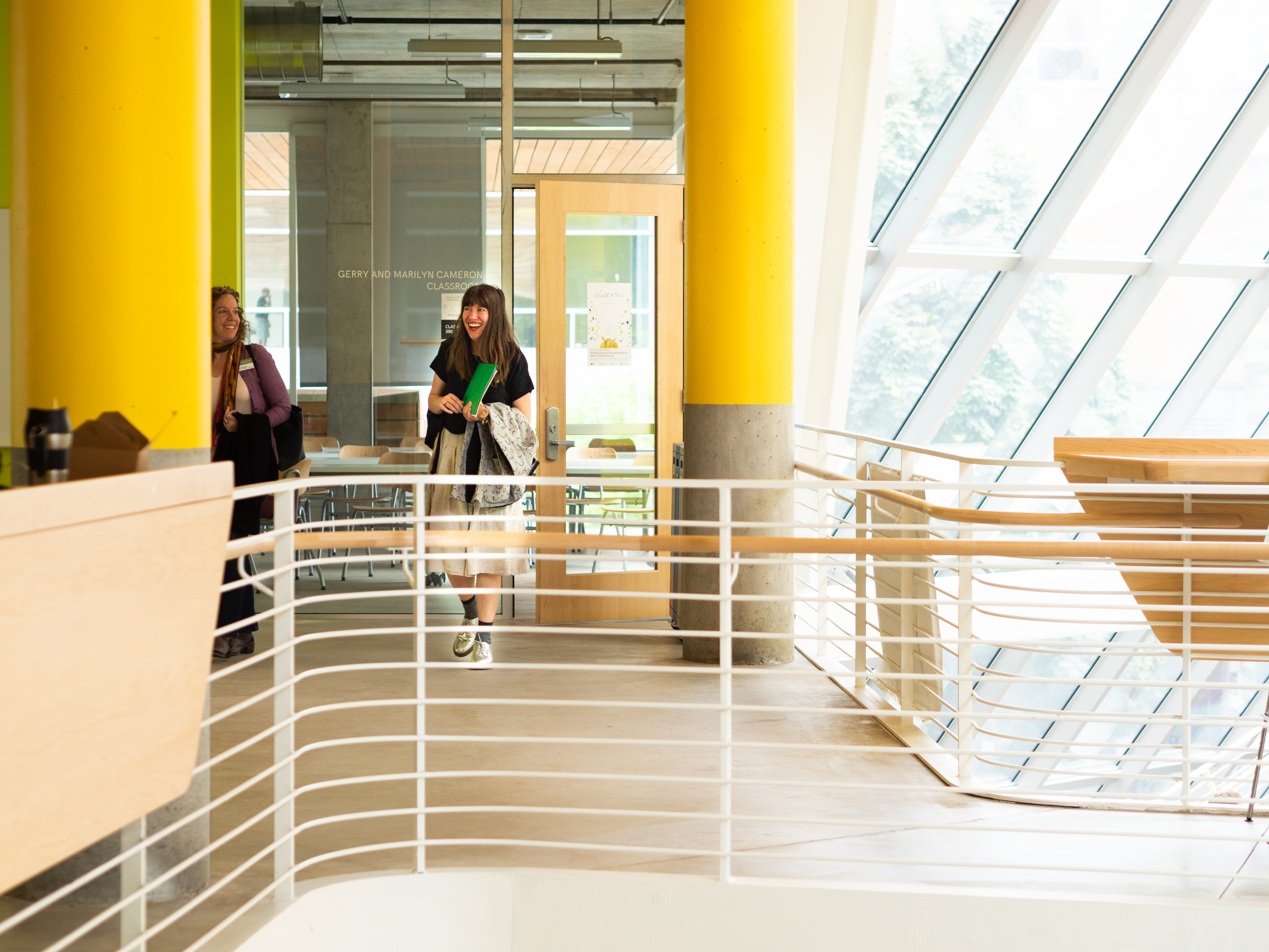 student walking in university hall