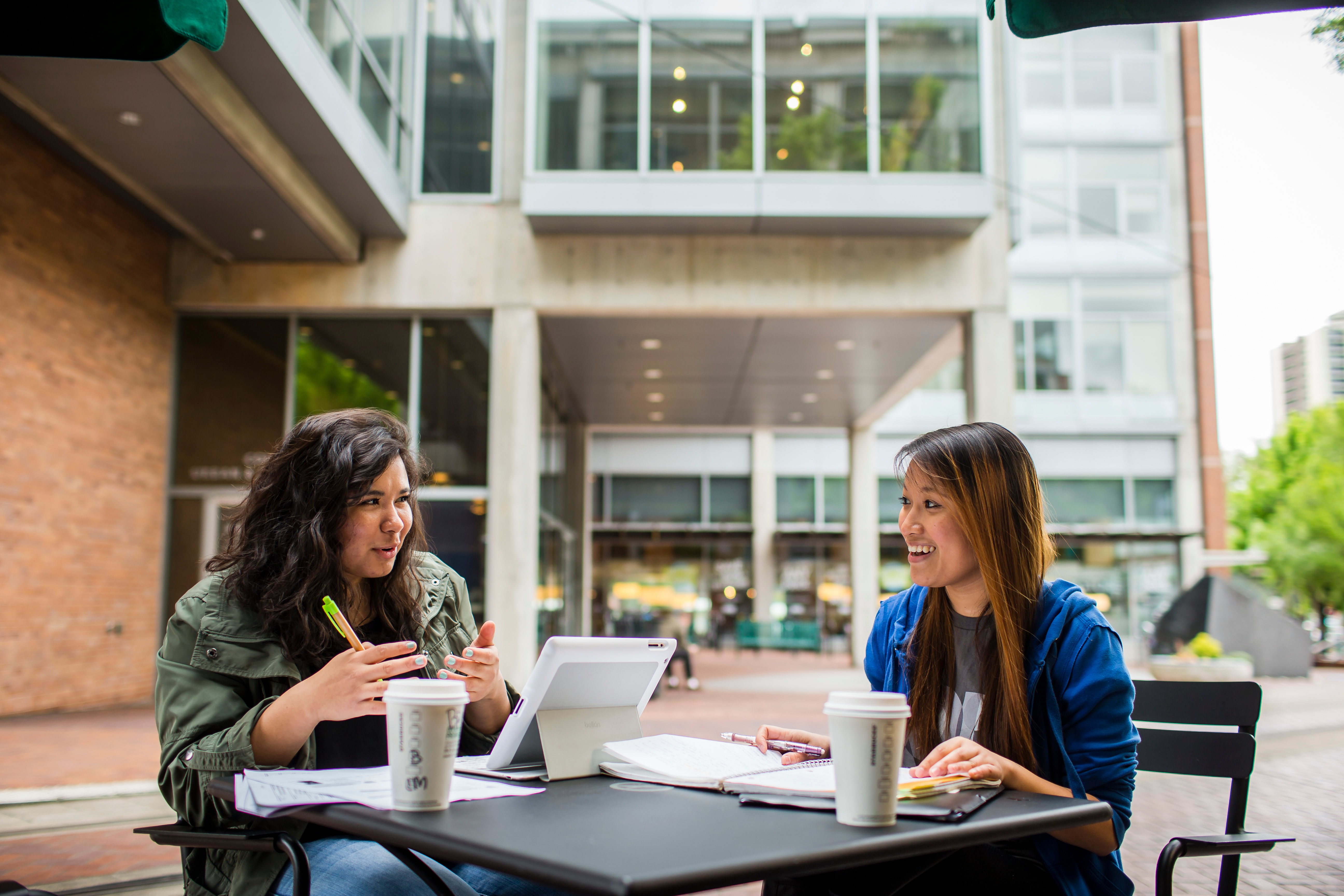 faculty and student talking together