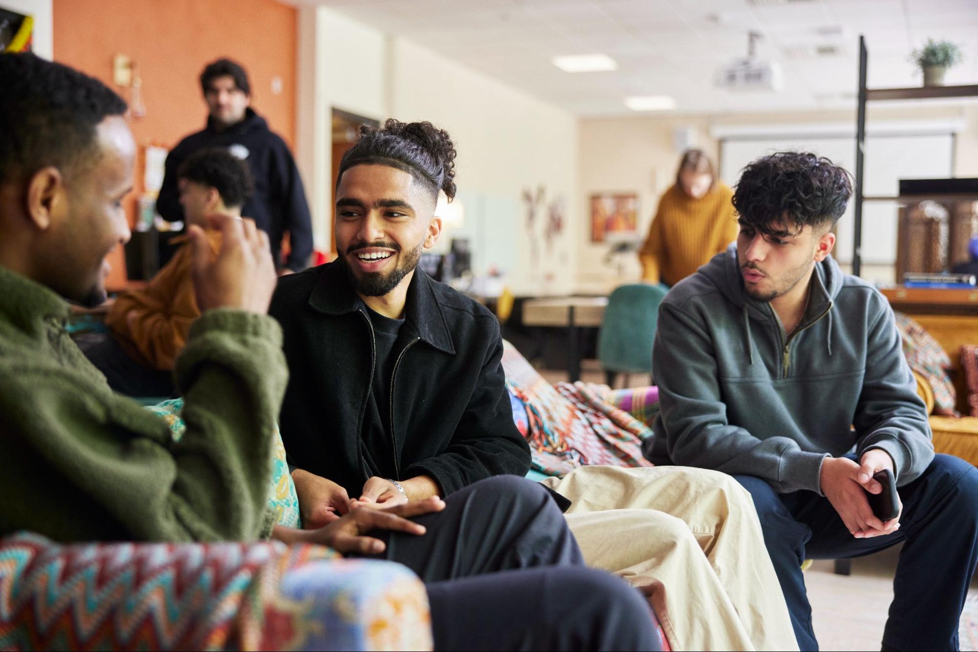students chatting in a resource center