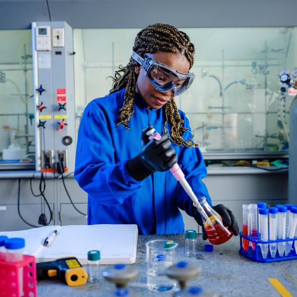 Grad Student working in science lab