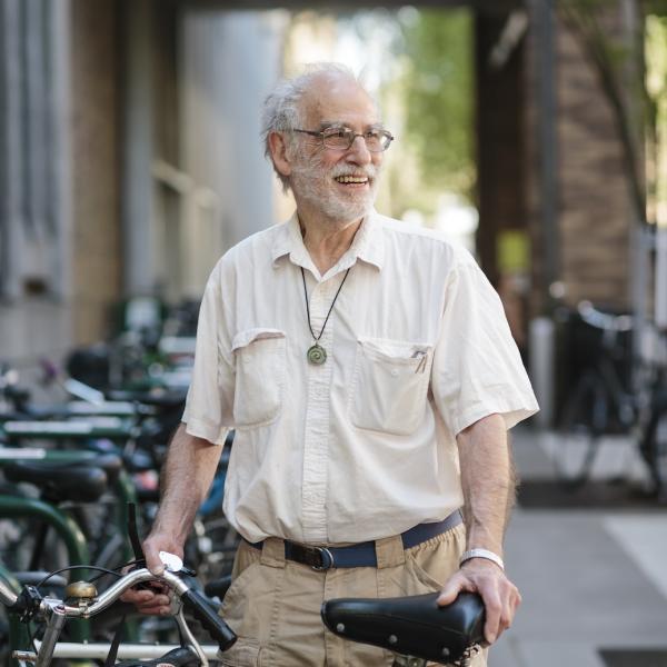 Tony Wolk on campus with a bike