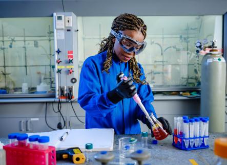 Grad Student working in science lab