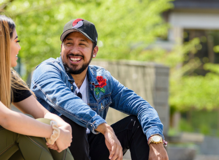 Students sitting on steps talking