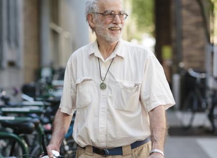 Tony Wolk on campus with a bike