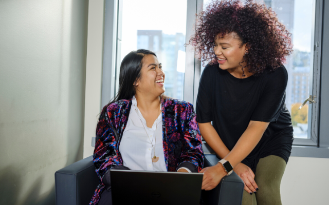 A student working with an advisor