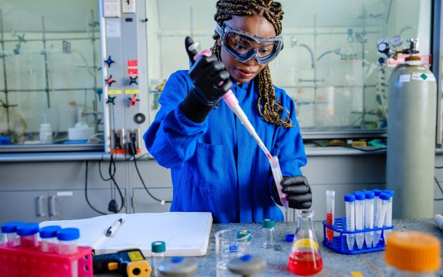 Graduate student working in a lab