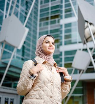 international student outside building