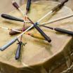 Native American drum with mallets laying on top