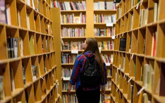 Photo of student in bookstore