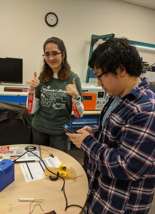 Student giving a thumbs up