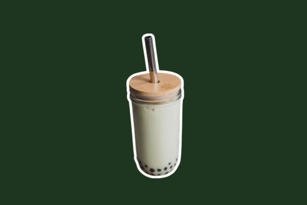 Reusable glass boba tea jar with a bamboo lid and straw.