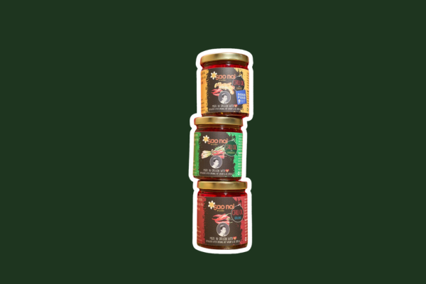 Three jars of Sao Noi chili oils stacked on top of each other.