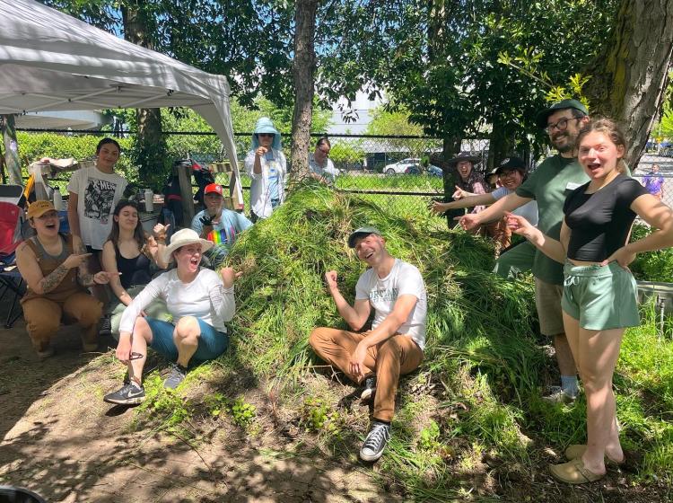 Alumni gardening in the PSU Community Orchard