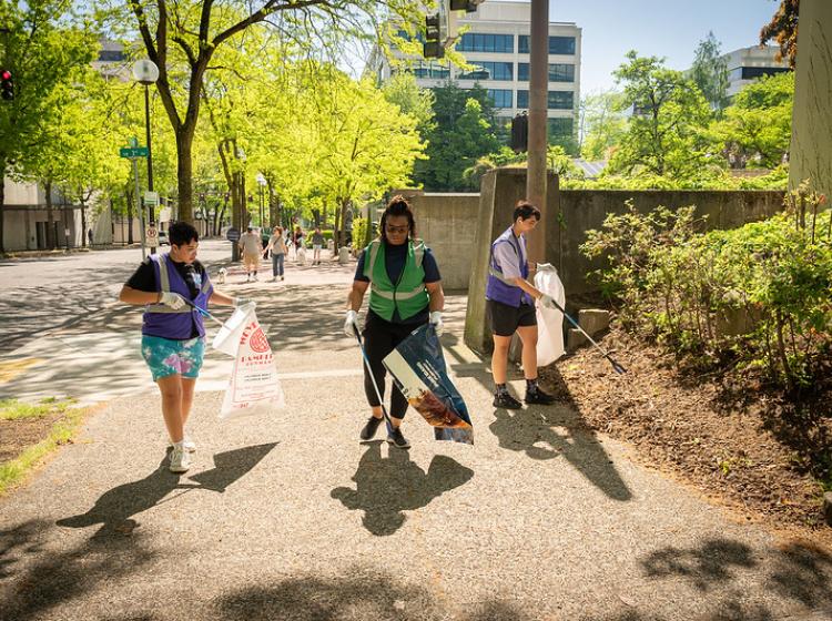 Volunteers picking up trash on campus