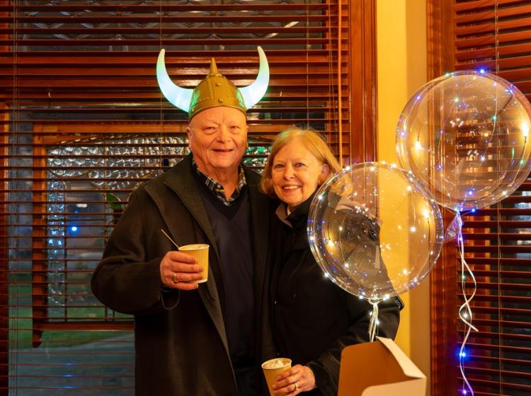 Attendees at the Simon Benson House for the 2025 Winter Light Festival open house.