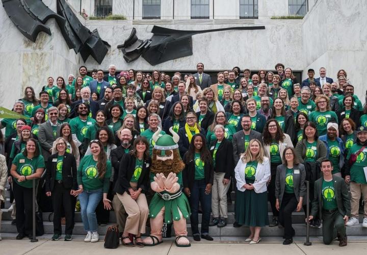 PSU Advocates pose outside the state capitol in Salem.
