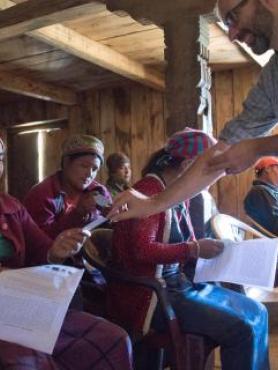 Prof. Spoon working with group of Nepalis 