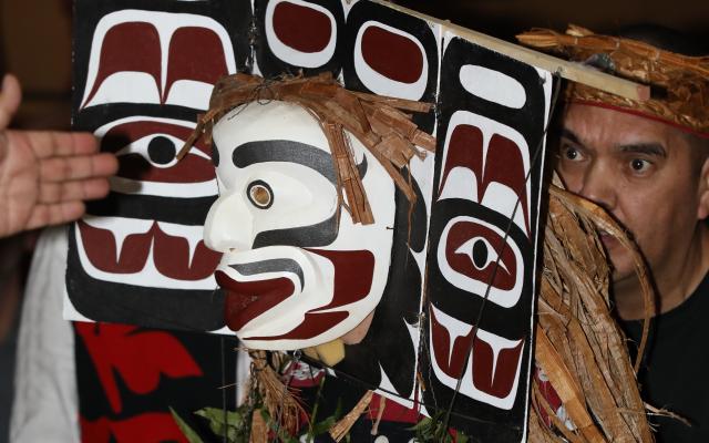 Man with Native American art