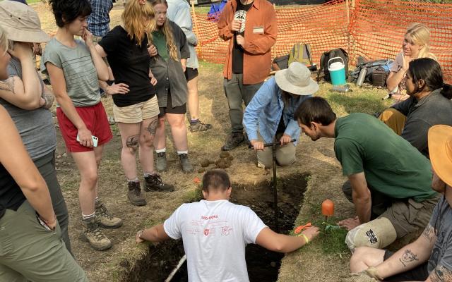 Students conducting archaeological dig