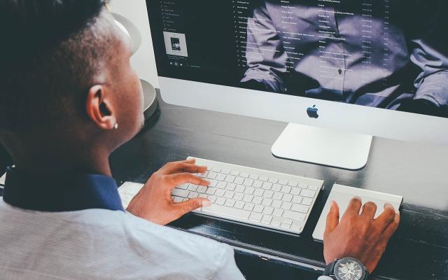 Man sitting at computer