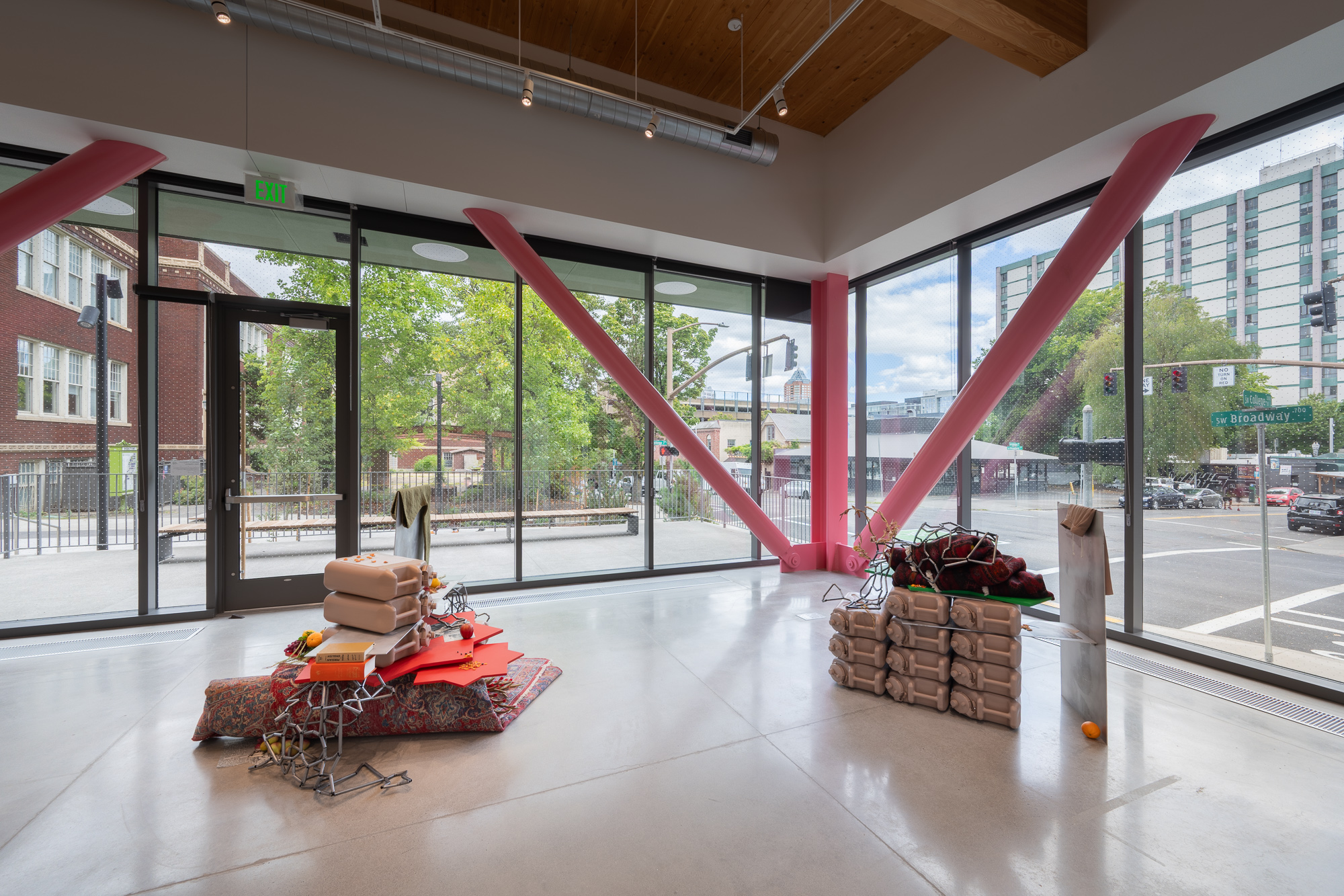 General view of gallery looking towards two full walls of windows.